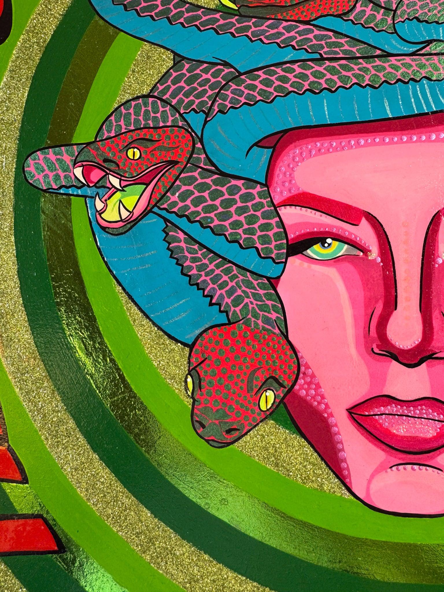 Extreme close-up detail of Look Me in the Eye — Tell Me to Smile! by Stoofy. A snake with open mouth and painted fangs dominates the left, its blue and pink scales individually rendered. To the right, Medusa's magenta pink face with Ben-Day dot forehead, a single green-gold eye visible, and full lips. A second red snake head with yellow eyes sits below. Gold-green glitter on the concentric ring is visible at left. Scale-by-scale and dot-by-dot hand painting throughout. © Stoofy

