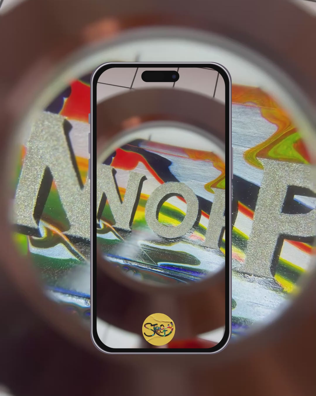 Stoofy - video capturing Hand-painted 'NOPE TO TAUPE' sign being looked at underneath a magnifying glass, highlighting its bold, colourful, glittery lettering, background and shiny gloss finish. Maximalist cotemporary art that makes a statement